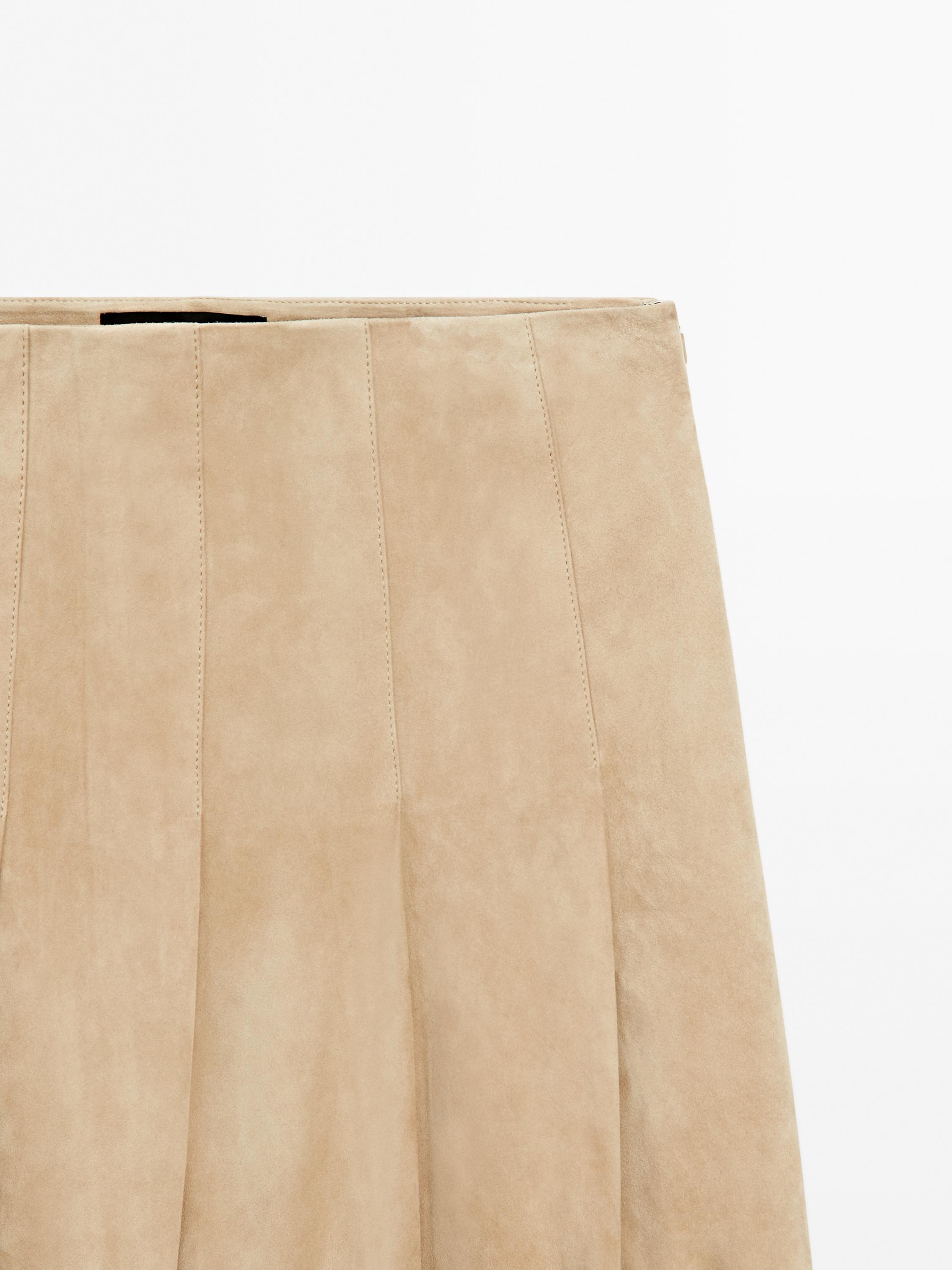 Jupe longue plissée en cuir finition daim